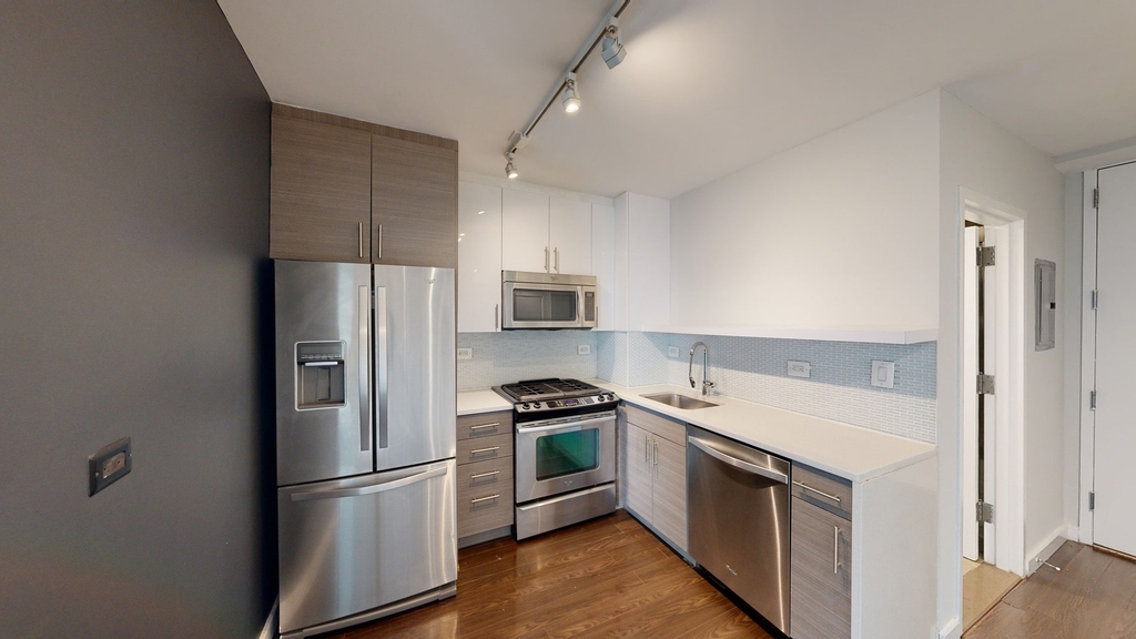 401 E 34th St - Photo 1
