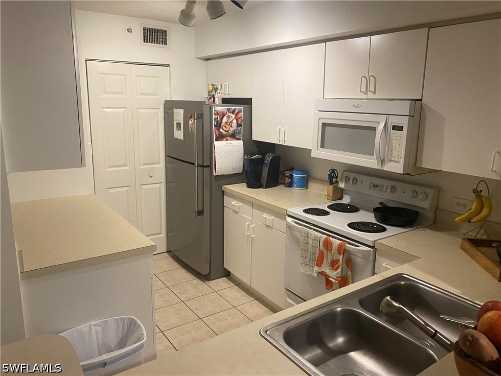 8940 Colonnades Court E - Photo 1