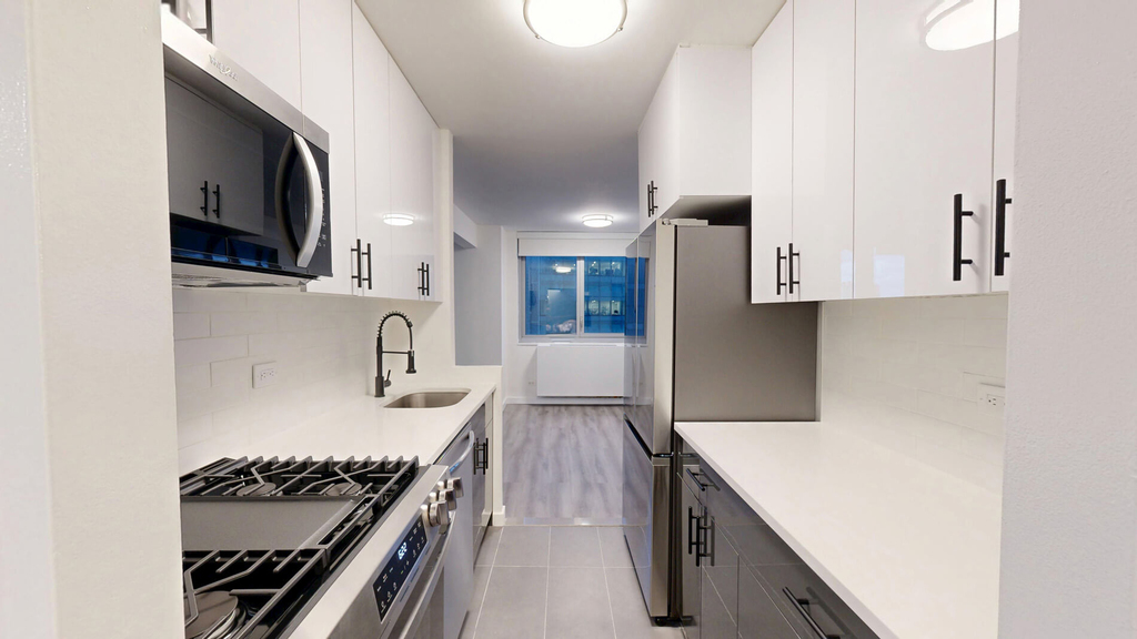 401 E 34th St - Photo 1