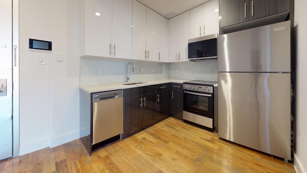 138-28 Queens Blvd - Photo 5