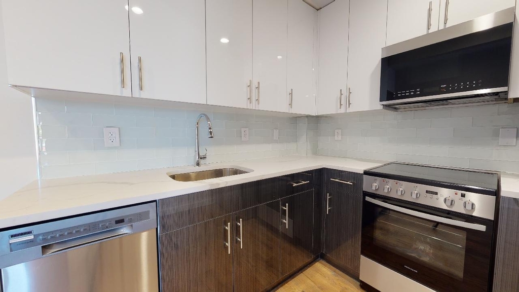 138-28 Queens Blvd - Photo 1