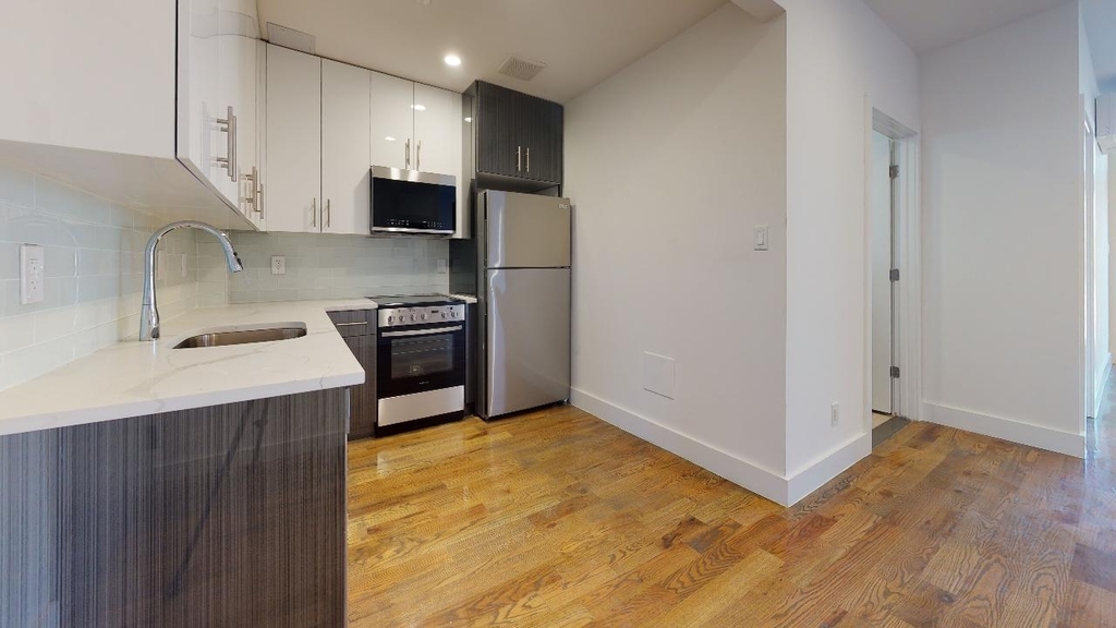 138-28 Queens Blvd - Photo 6