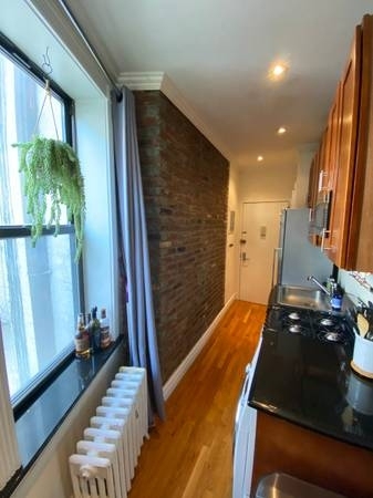 E 13th St. - Photo 4