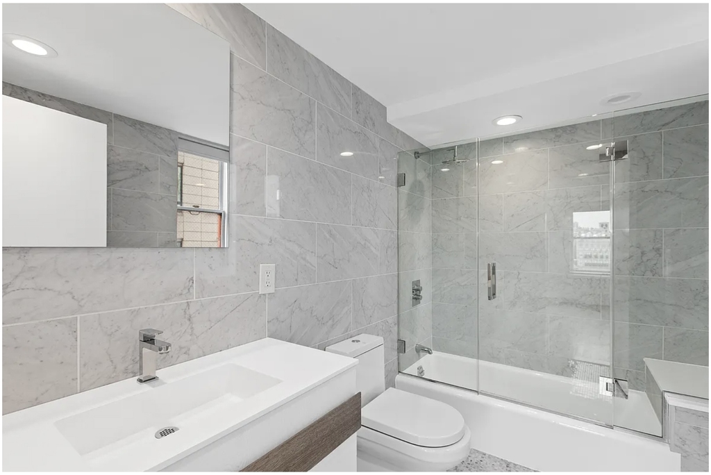 40 E 61st St - Photo 3