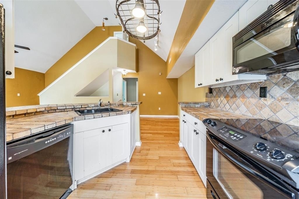 9156 Lake Chase Island Way - Photo 19