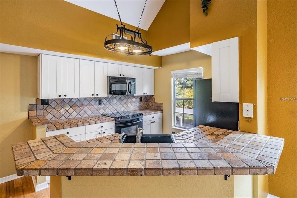 9156 Lake Chase Island Way - Photo 21