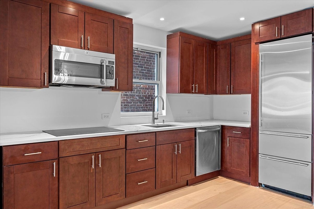 East 240th Street - Photo 4