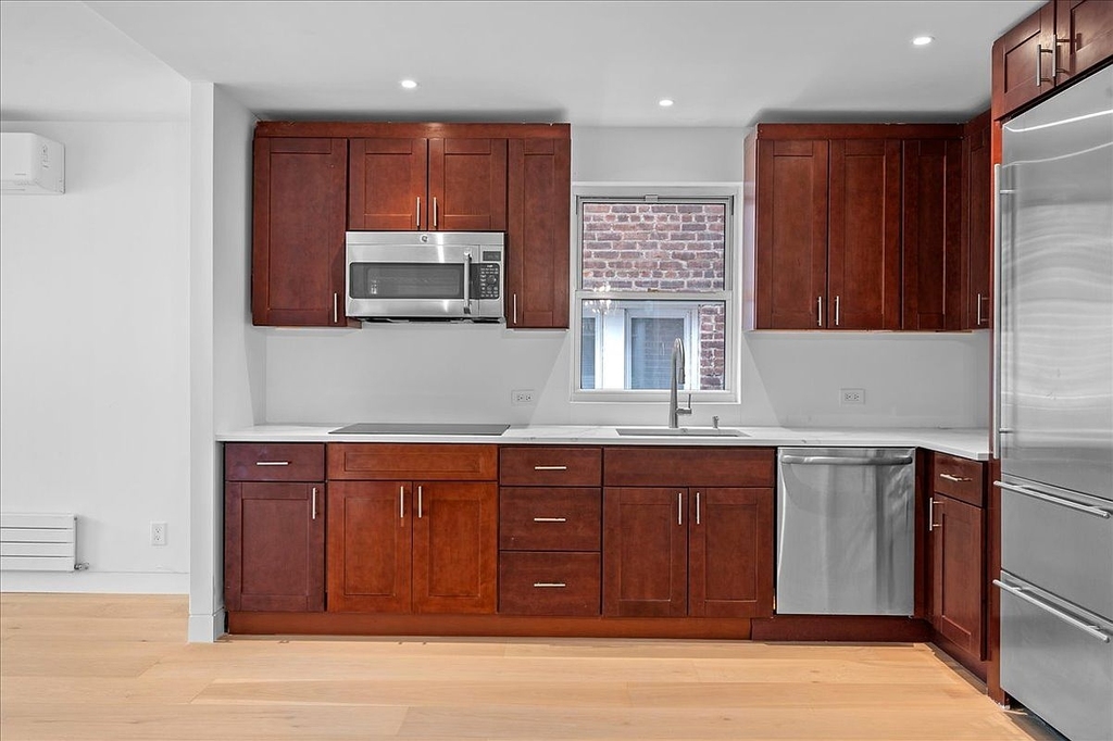 East 240th Street - Photo 5