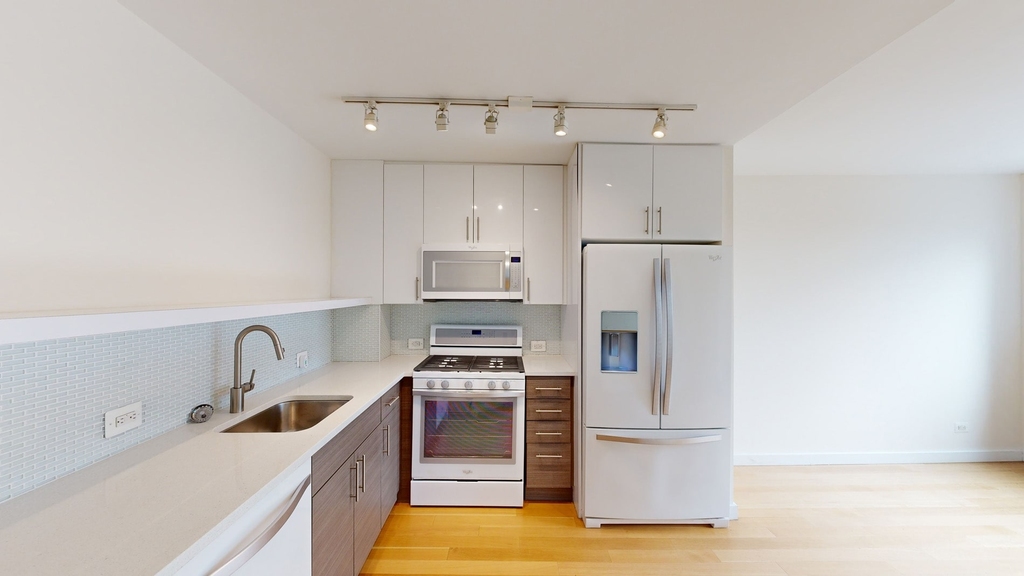 401 E 34th St - Photo 1