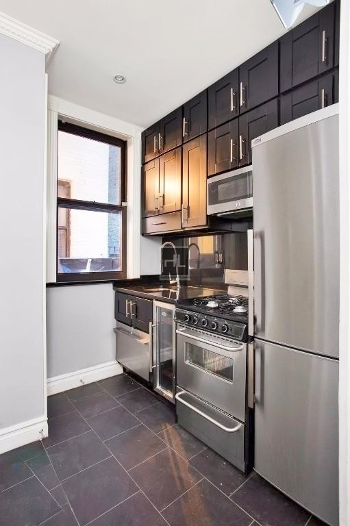 E 23rd St. - Photo 2