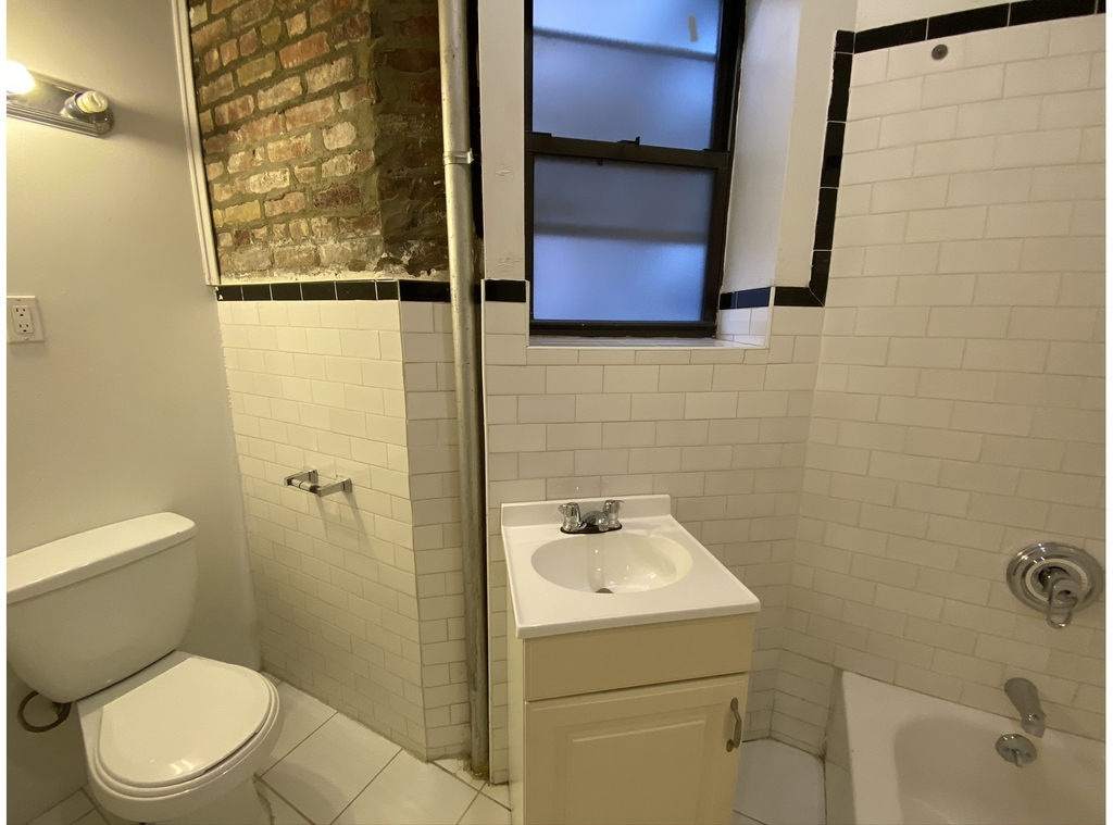 237 E 58th St - Photo 9