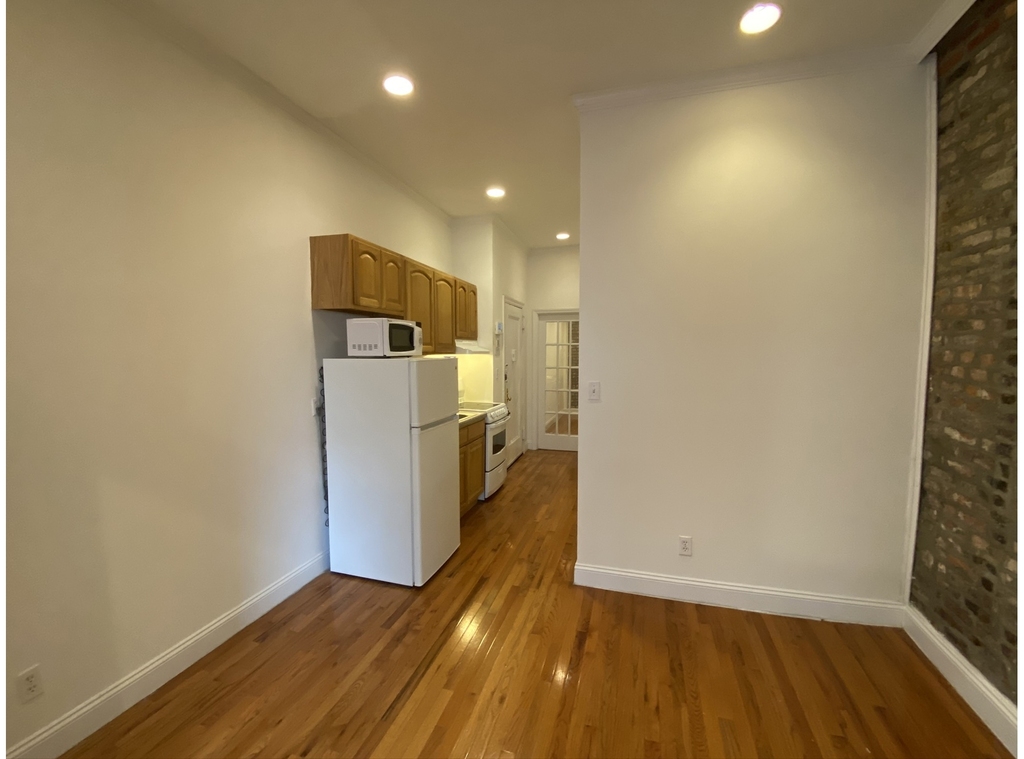 237 E 58th St - Photo 8