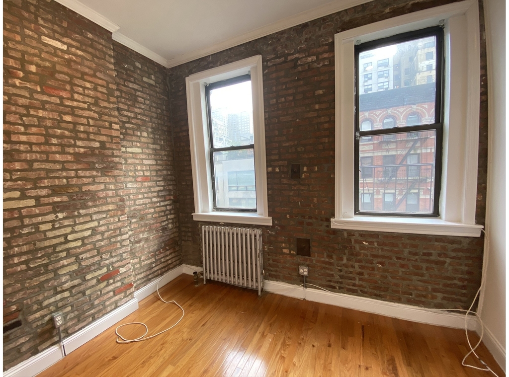 237 E 58th St - Photo 11