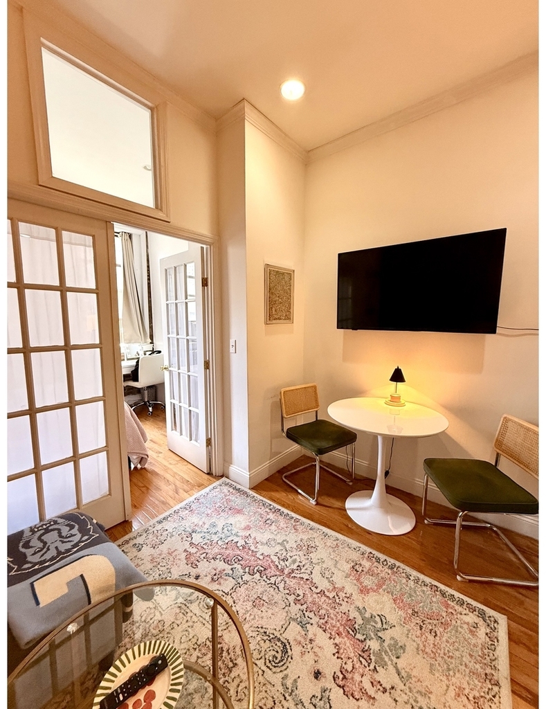 237 E 58th St - Photo 4