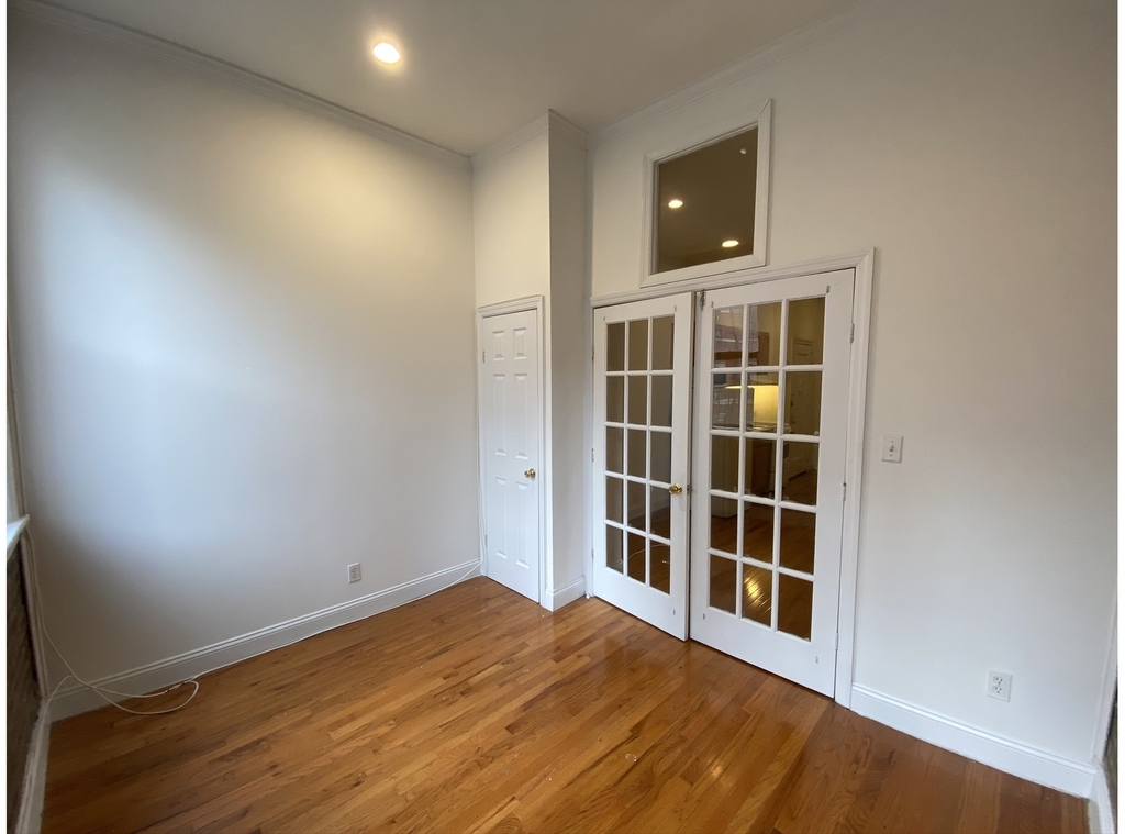 237 E 58th St - Photo 10