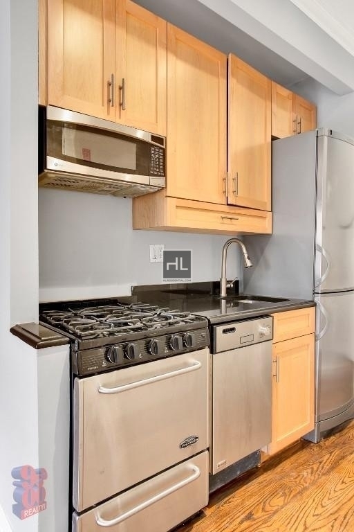 E 13th St. - Photo 3