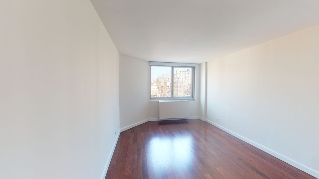 401 E 34th St - Photo 1
