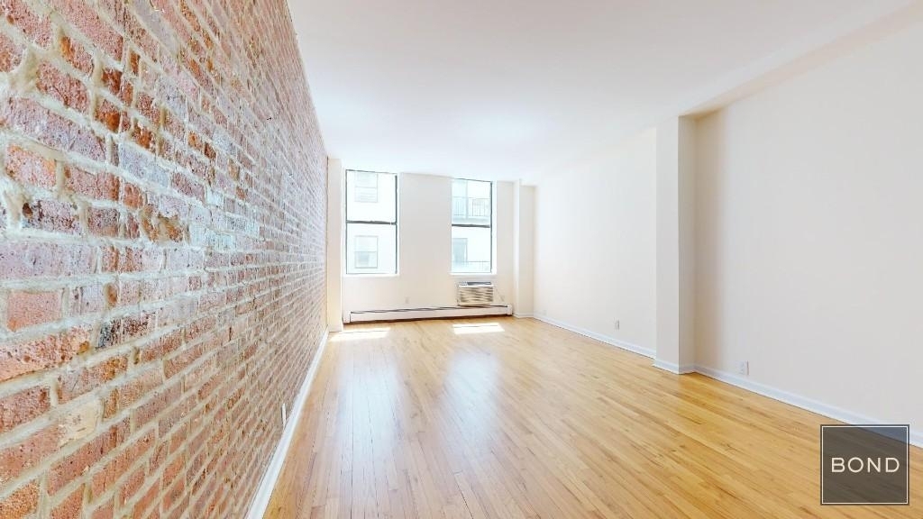 201 East 12th Street - Photo 0