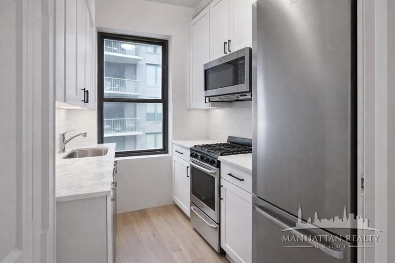 E 56th St - Photo 2