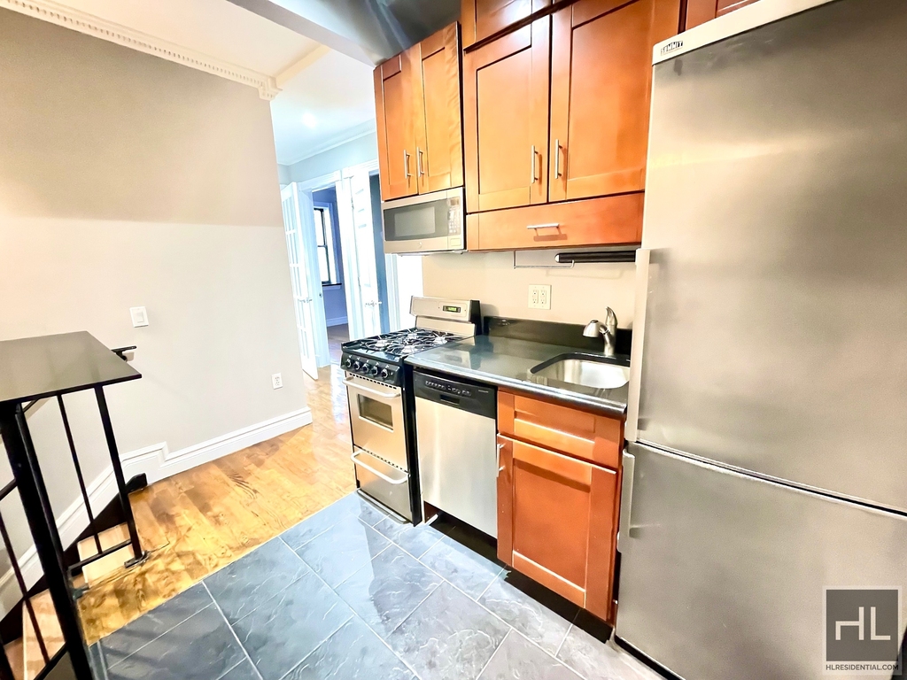 E 13th St. - Photo 2