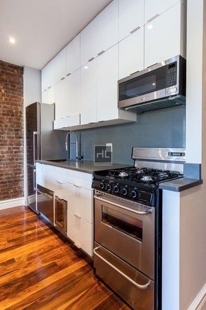 E 13th St. - Photo 3