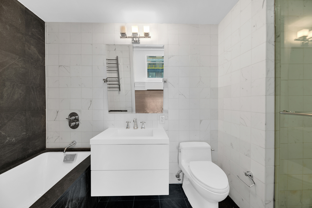100 W 58th St - Photo 7