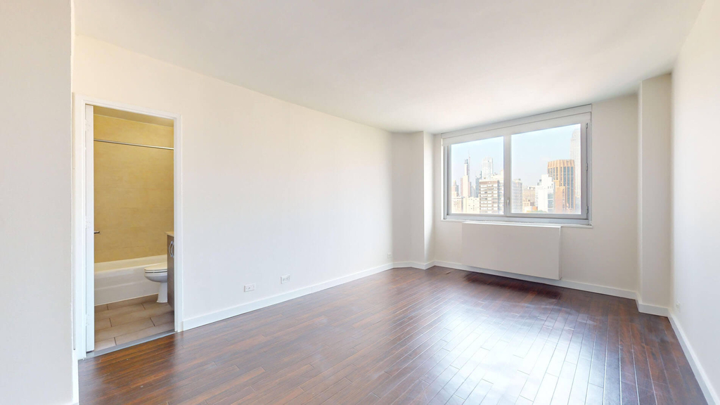401 E 34th St - Photo 4