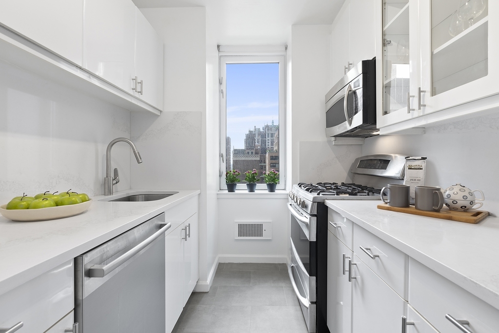 235 E 40th St - Photo 2
