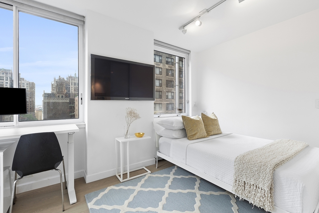 235 E 40th St - Photo 5