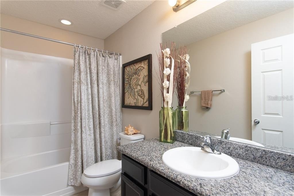 7083 Woodchase Glen Drive - Photo 11