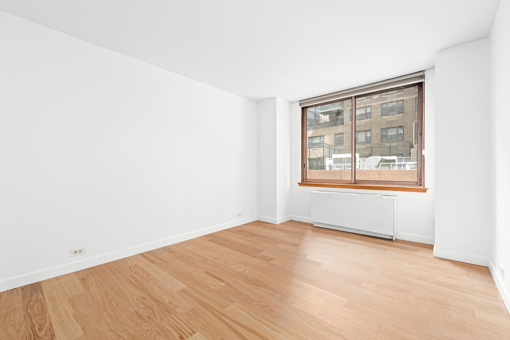 235 E 40th St - Photo 5