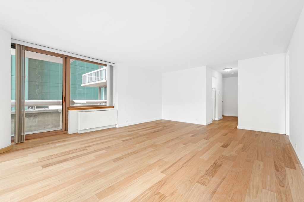 235 E 40th St - Photo 2