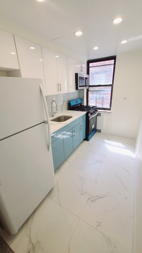 98-76 Queens Boulevard - Photo 2