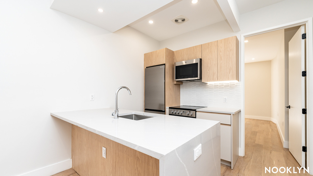 242 6th St 11215 - Photo 1