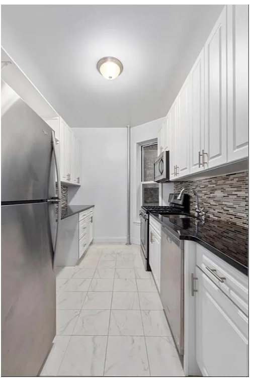 220 E 36th St - Photo 1