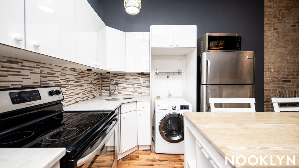 68 Halsey St 11216 - Photo 1