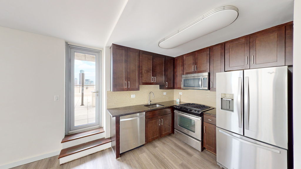 401 E 34th St - Photo 1