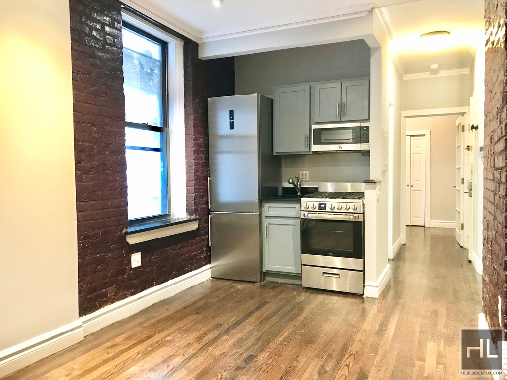 E 13th St. - Photo 4