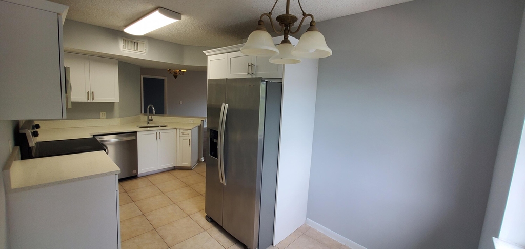 9033 Wiles Road - Photo 8