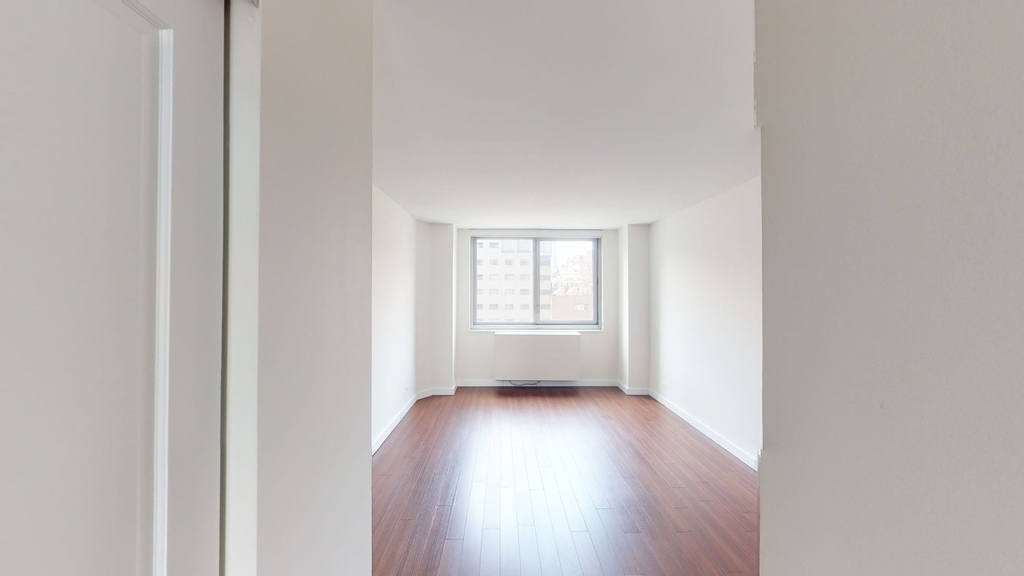 401 E 34th St - Photo 2
