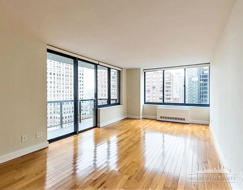 W 48th St - Photo 0