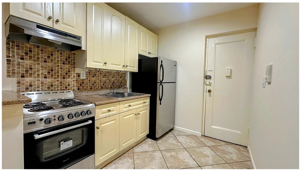 415 E 75th St - Photo 2