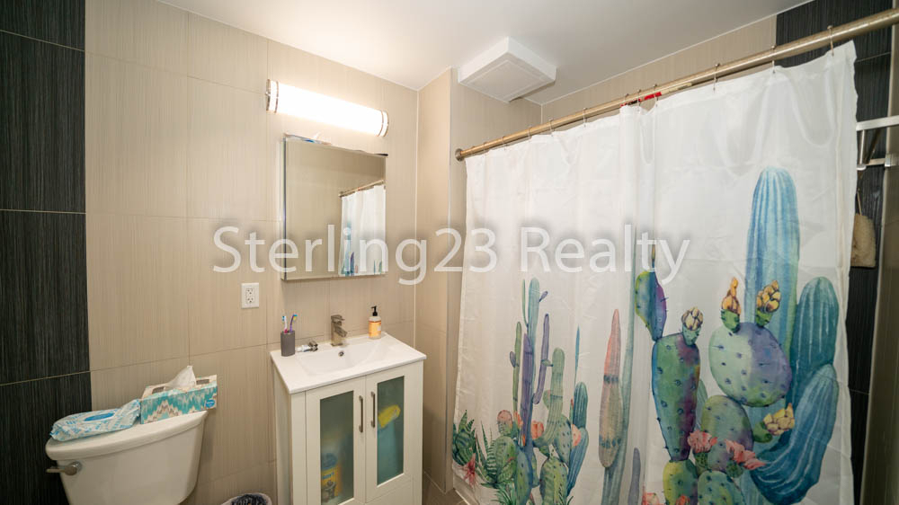 23-15 Astoria Boulevard - Photo 12