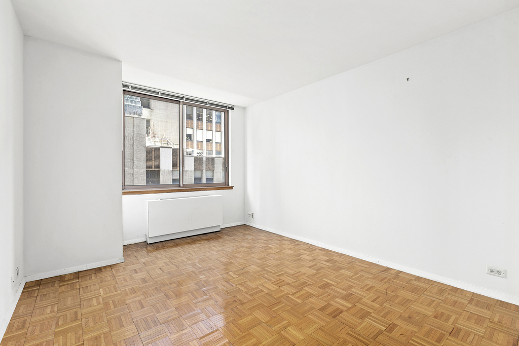 235 E 40th St - Photo 5