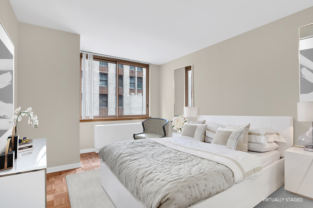 235 E 40th St - Photo 4