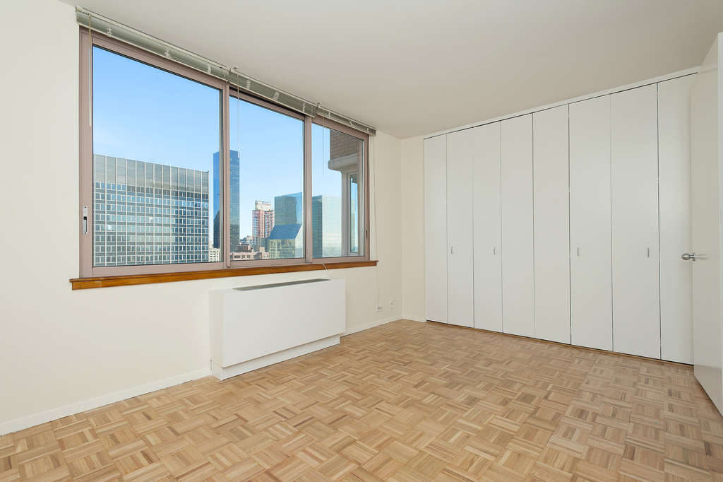 235 E 40th St - Photo 6