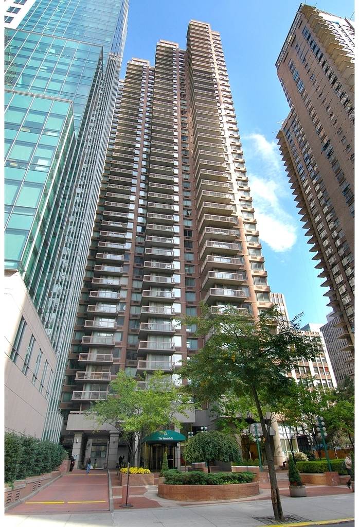 235 E 40th St - Photo 16