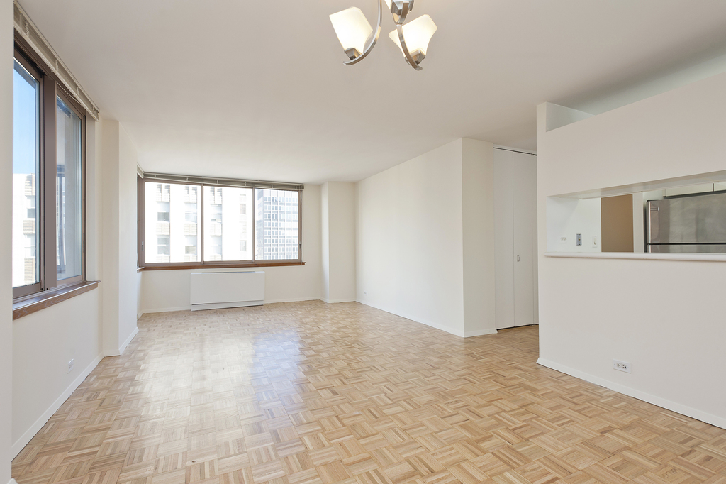 235 E 40th St - Photo 2