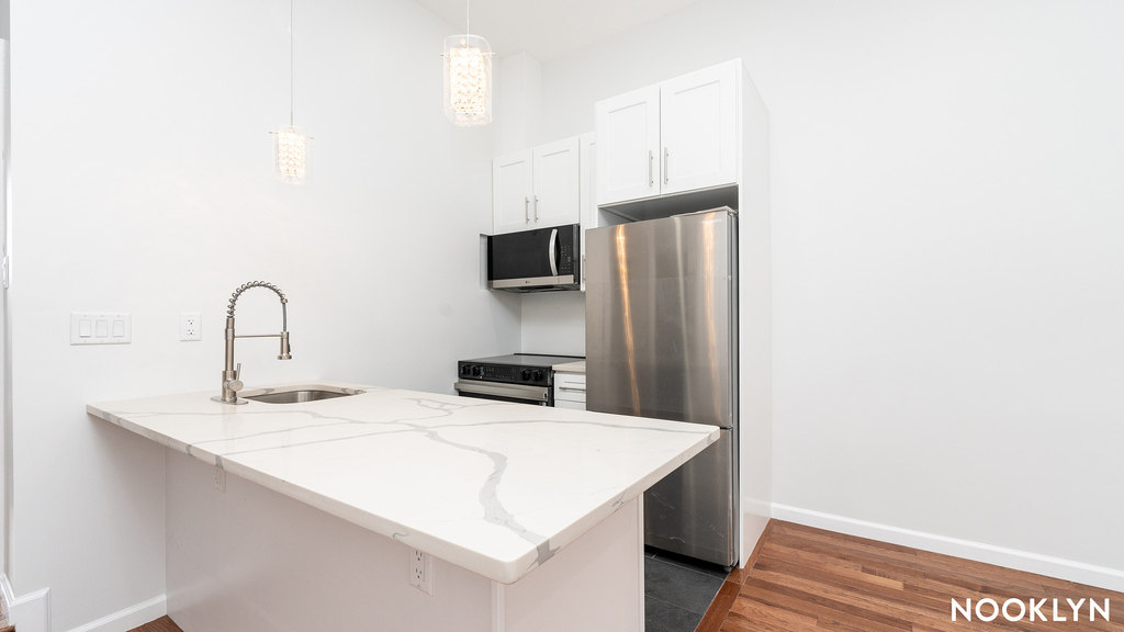 18-69 Greene Ave - Photo 11