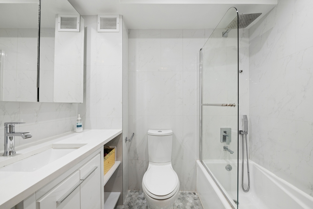 330 E 38th St - Photo 5